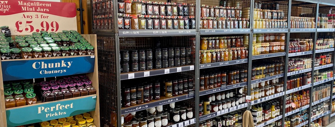 Longacres Bourne Valley Farm Shop with shelves full of quality jams and chutneys