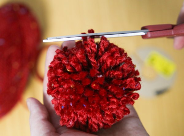 finishing touches to the perfect pom-pom