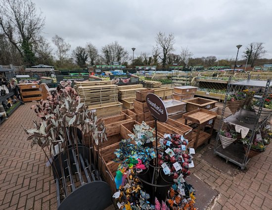 Image of the outdoor wood yard and stoneware department at Longacres Shepperton