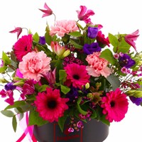Pink and Purple Gerbera and Clematis Hat Box Floral Arrangement - Medium