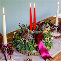 Mulberry and Mistletoe Festive Table Arrangement With Candles